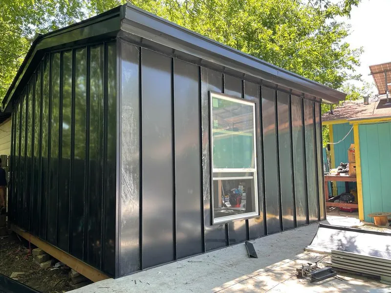 Black standing seam metal wall panels for Metal Roof Installation in Roswell